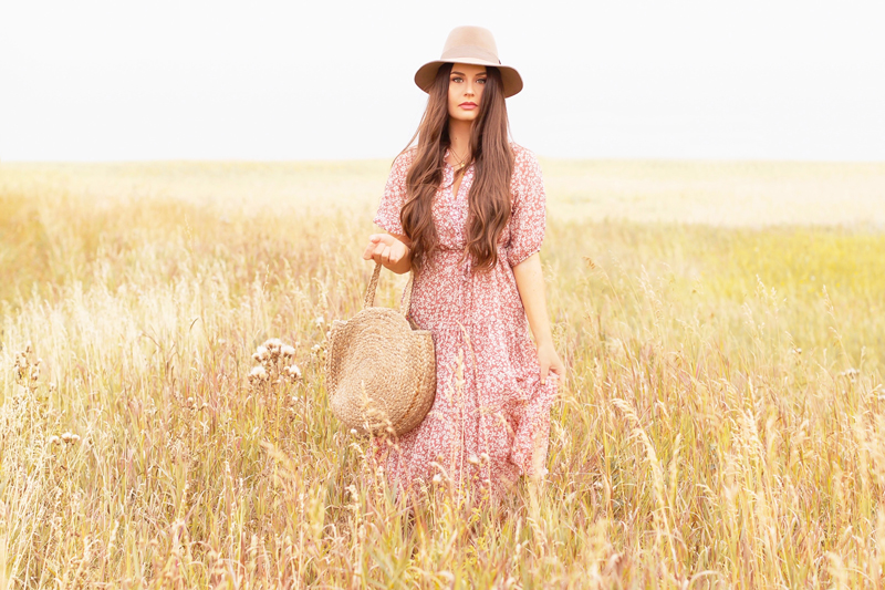 Early Autumn 2020 Lookbook | Prairie Chic | Brunette woman wearing a rose floral midi dress, a tan felt fedora and a round jute bag in a wheat field | Boho Fall 2020 Outfit Ideas | Top Fall 2020 Trends | Fall on the Alberta Prairies | Thanksgiving Outfit Idea | Bohemian Fall outfit Ideas | The Best H&M Knitwear | The Best New Look Chiffon Dresses | Cottagecore Fall Outfit Ideas | How to Style Summer Dresses Into Fall Calgary Alberta Fashion & Lifestyle Blogger // JustineCelina.com