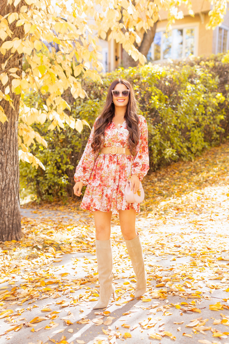 Early Autumn 2020 Lookbook | Smiling brunette woman wearing a fall floral dress with statement sleeves, a rattan belt, knee high tan suede pointed toe boots and a grey Chloe Drew saddle bag with cat eye sunglasses | Boho Fall 2020 Outfit Ideas | Fall in Calgary | How to Style Summer Dresses Into Fall |  warm weather fall outfit ideas | How do you transition summer clothes for fall | Top Summer / Fall Trends and how to wear them | Calgary Alberta Fashion & Lifestyle Blogger // JustineCelina.com