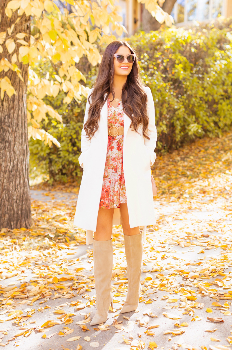 Early Autumn 2020 Lookbook | Urban Florals | Smiling brunette woman wearing a fall floral dress with a cream wrap coat, a rattan belt, knee high suede pointed toe boots and a pink Chloe Drew bag with cat eye sunglasses | Boho Fall 2020 Outfit Ideas | Fall in Calgary | How to Style Summer Dresses Into Fall | warm weather fall outfit ideas | How do you transition summer clothes for fall | Top Summer / Fall Trends | Calgary Alberta Fashion & Lifestyle Blogger // JustineCelina.com