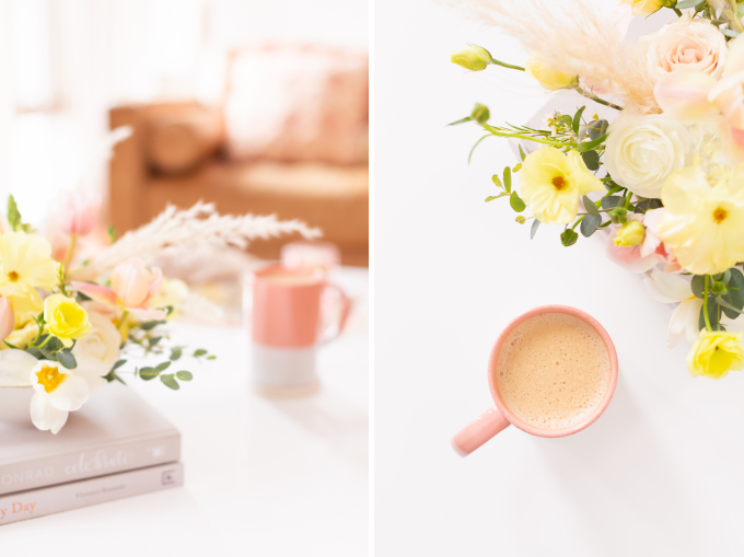 Easter flower arrangement with pampas grass on white coffee table with a pink mug in bright and airy boho living room | Calgary Lifestyle Blogger // JustineCelina.com