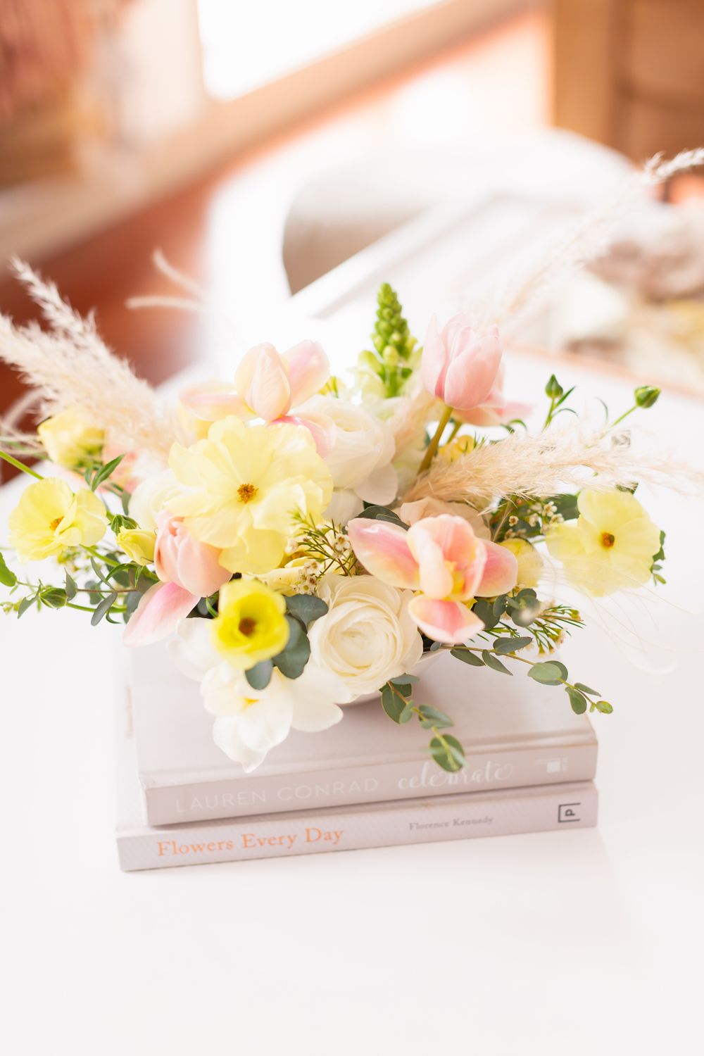 A Pastel Easter Flower Arrangement featuring Quicksand and Spray Roses, Ranunculus and Butterfly Ranunculus, Tulips, Hyacinths, Lisianthus, Eucalyptus, Wax Flowers and Pampas Grass | Calgary Lifestyle Blogger // JustineCelina.com