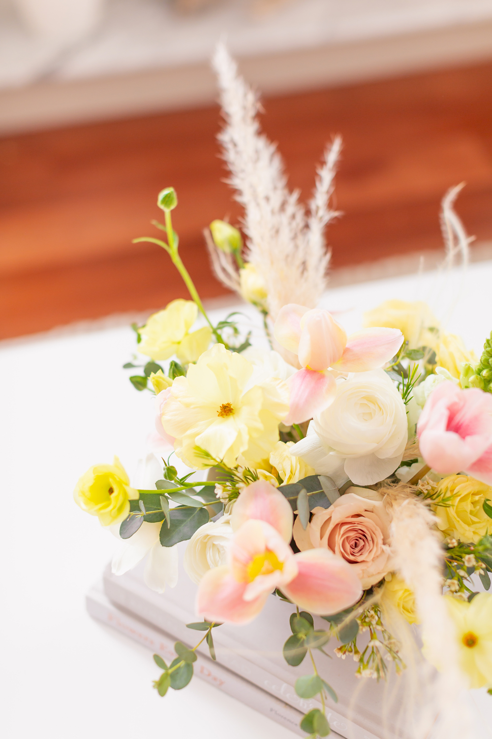 A Pastel Easter Flower Arrangement featuring Quicksand and Spray Roses, Ranunculus and Butterfly Ranunculus, Tulips, Hyacinths, Lisianthus, Eucalyptus, Wax Flowers and Pampas Grass | Calgary Lifestyle Blogger // JustineCelina.com