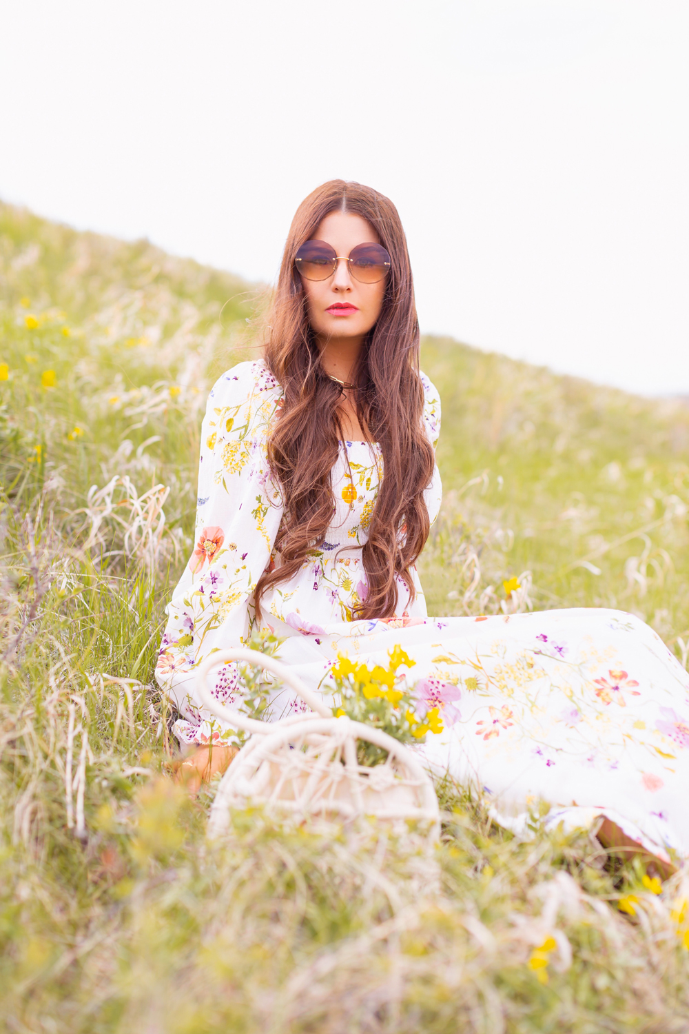 H&M Wildflower Collection Review | Brunette woman wearing a H&M A Meadow of Wildflowers Collection Smock-Detail Dress sitting in a prairie field with yellow sunflowers | H&M Wildflower Collection Canada | H&M Wildflower Collection Canada | Spring/Summer 2021 Trends | The Best Cotton Dresses 2021 | Boho Spring / Summer Outfit Ideas | The Best H&M Dresses Summer 2021 | Alberta Wildflower Field | Cottagecore Outfits | Calgary Creative Lifestyle & Fashion Blogger // JustineCelina.com